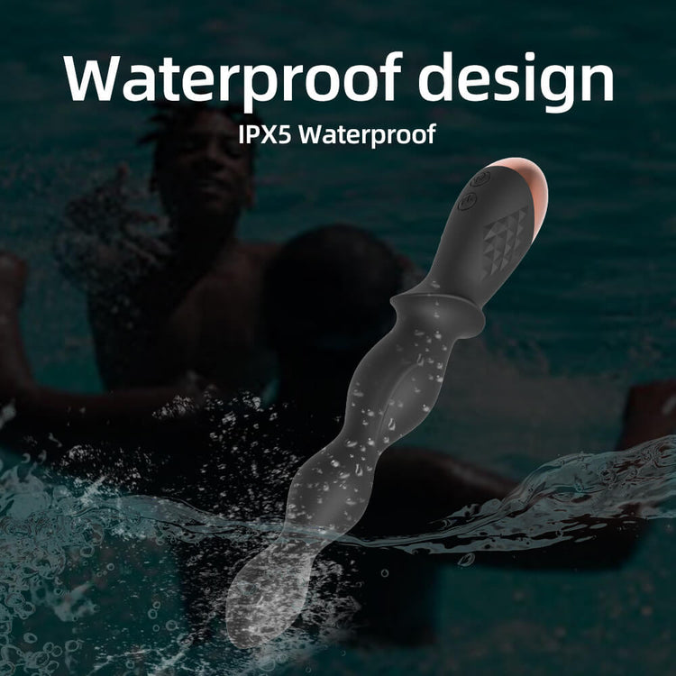 Dagger-3 IPX5 water-resistant vibrating anal beads shown with water splashes