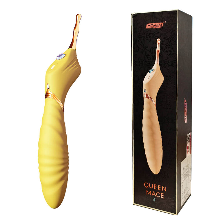 Yellow Luna pinpoint clitoral vibrator displayed beside its product packaging