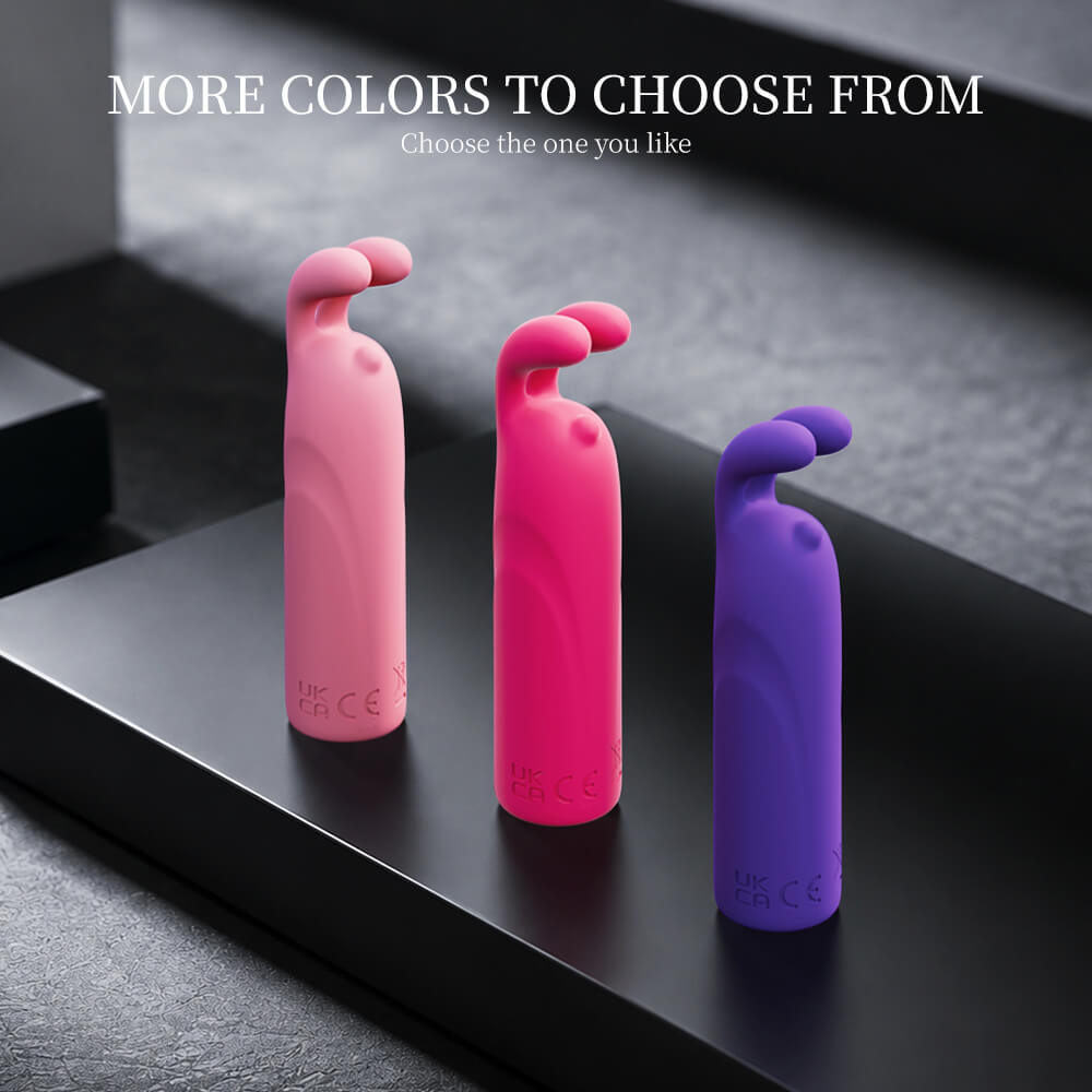 Bunny - Rabbit Bullet Vibrator with 10 Vibration Modes in pink and purple on a black surface with text about color options.