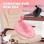 Pink and black Phoenix anal vibrators displayed on an office chair with remote control